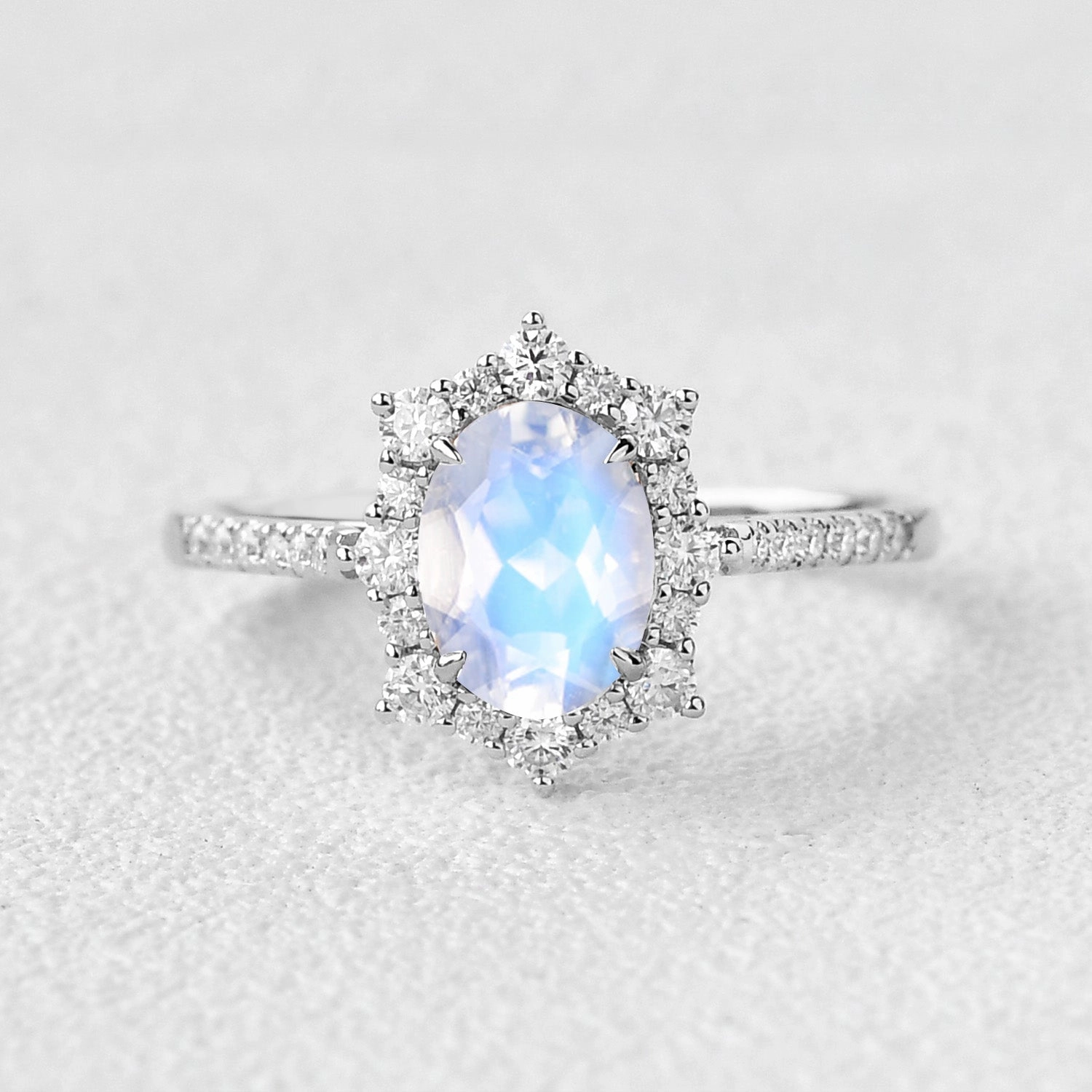 1.5ct Oval Moonstone Cluster Halo Ring Lively Detail Neutral Mood