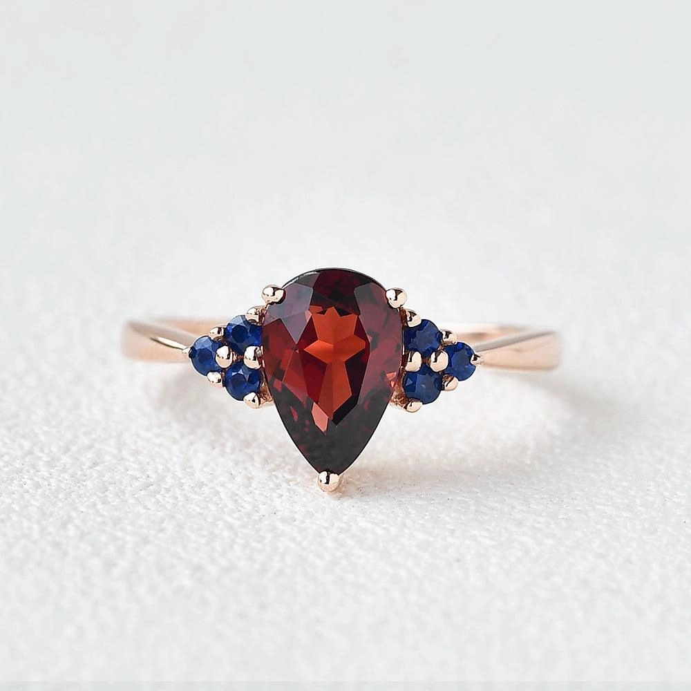 Instant Edge date night look 1.5ct Pear Shaped Garnet Rose Gold Ring