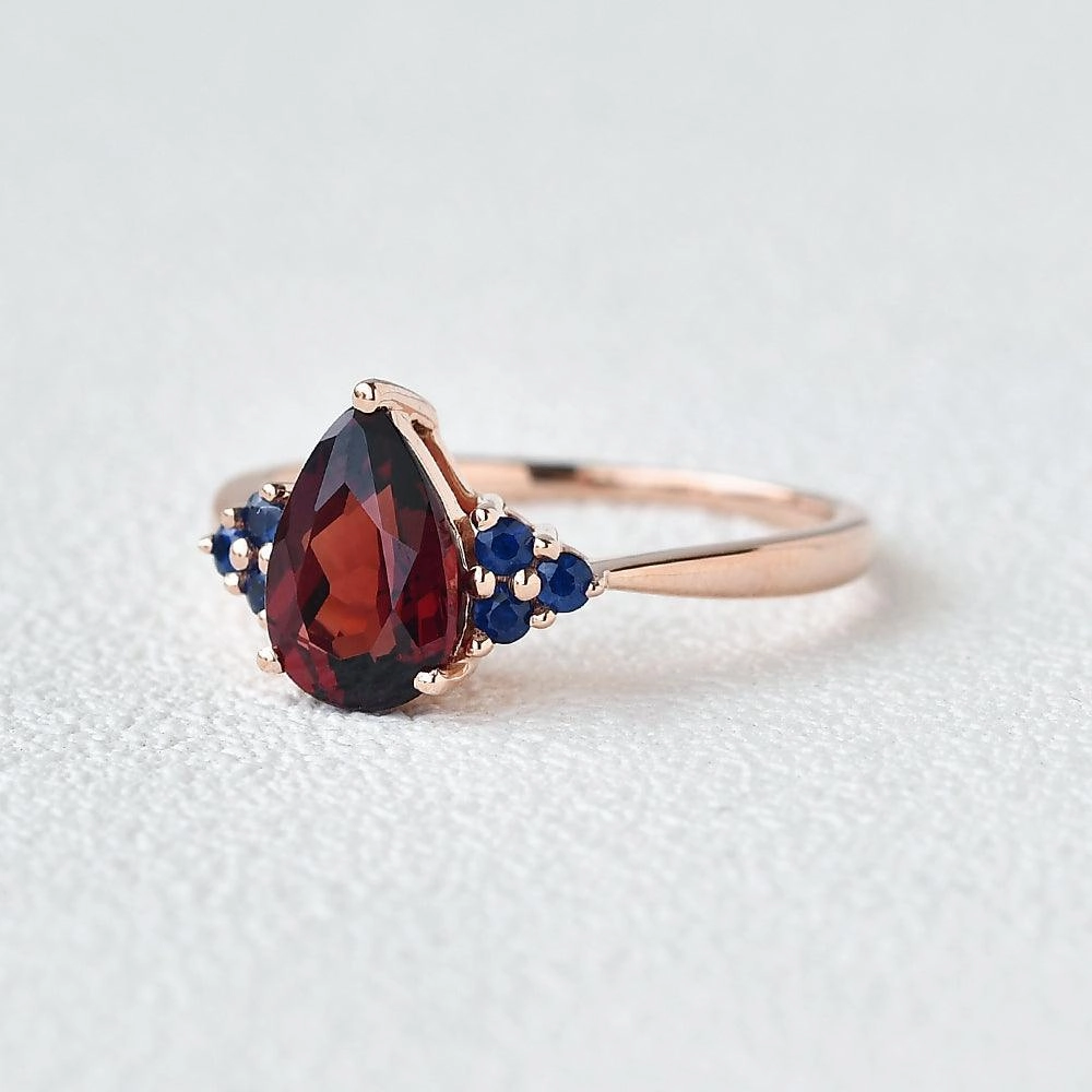 1.5ct Pear Shaped Garnet Rose Gold Ring Lustrous Design