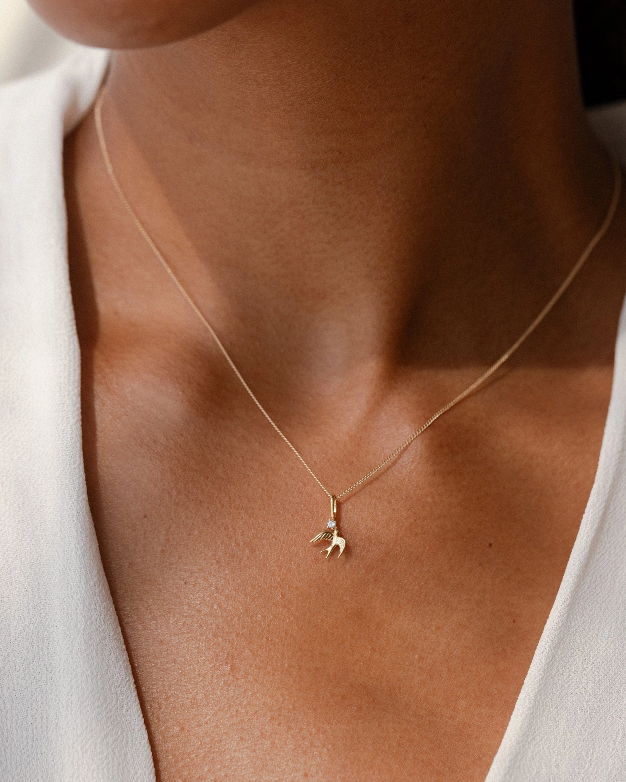 Daily Radiance Solid Gold Swallow Charm