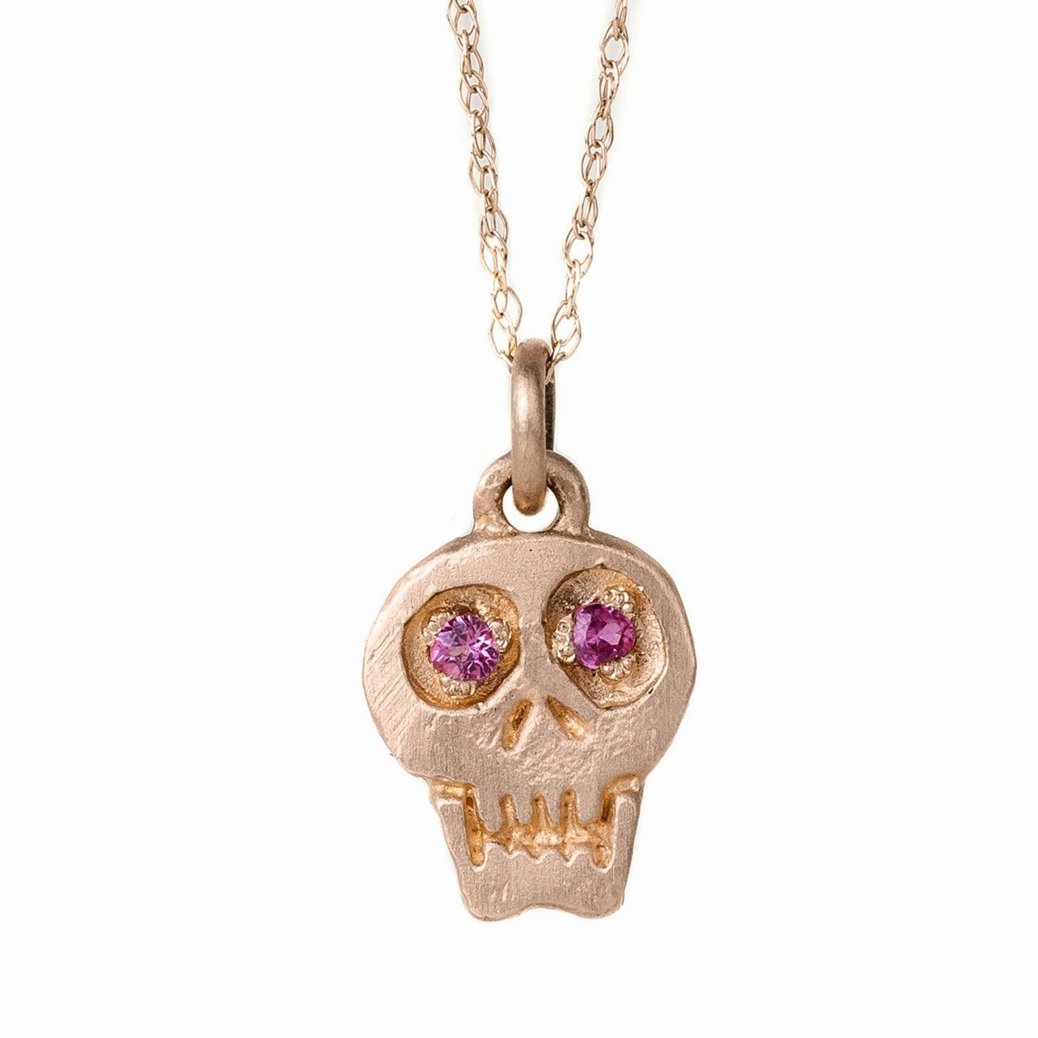 Subtle Elegance Charmed Skull Hot Pink Sapphire Necklace - 14k Gold