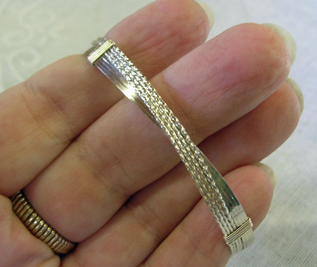 Ordinary Accent Crossover Sterling Silver Wire Wrapped Bracelet  SSSSTTTT