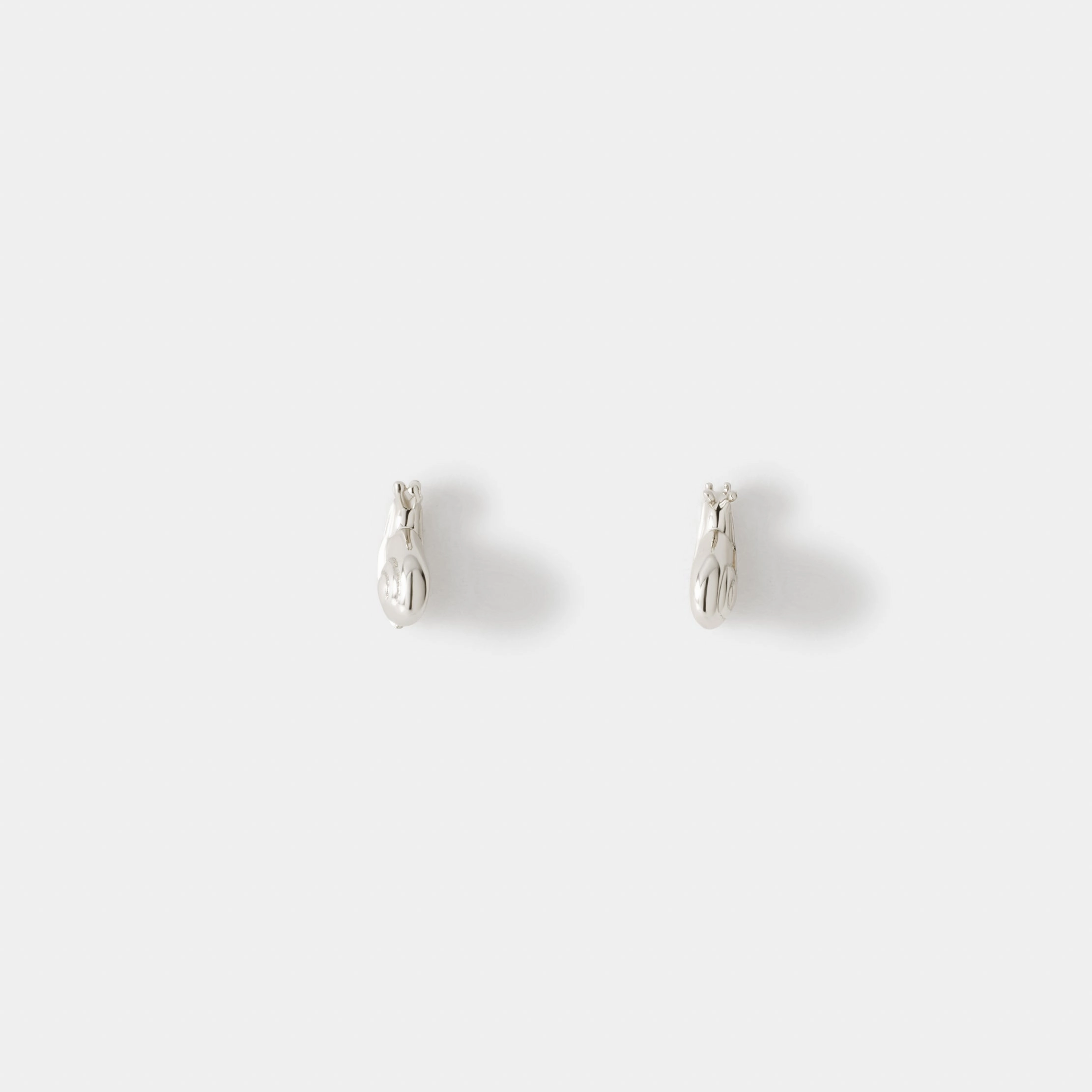Premium Radiance Quiet Glow Snail Studs