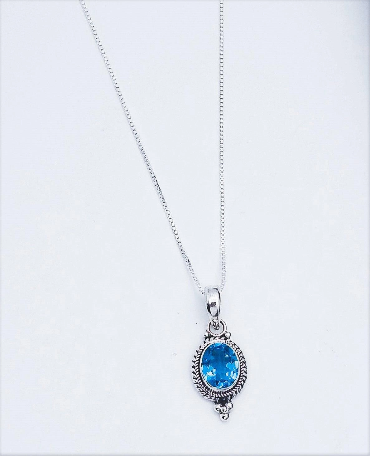 Sterling Silver Pendant With Blue Topaz Stylish Highlight