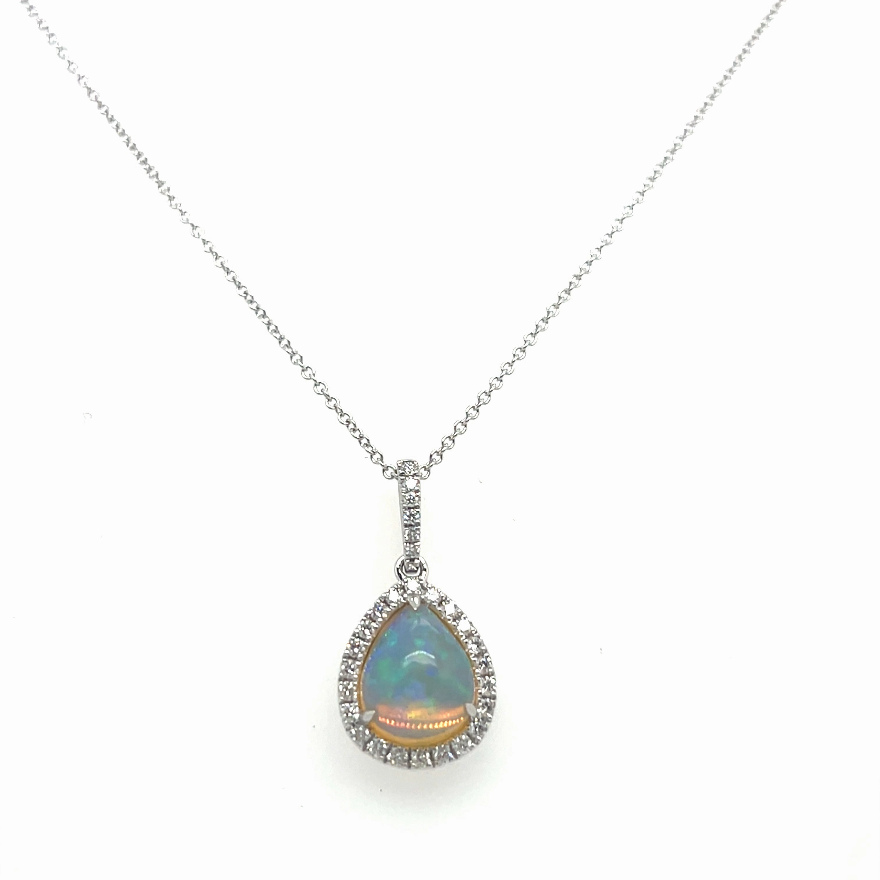 Exclusive Jewelry 14K White Gold Oval Shape Opal and Diamond Halo Pendant (2.11ctw)