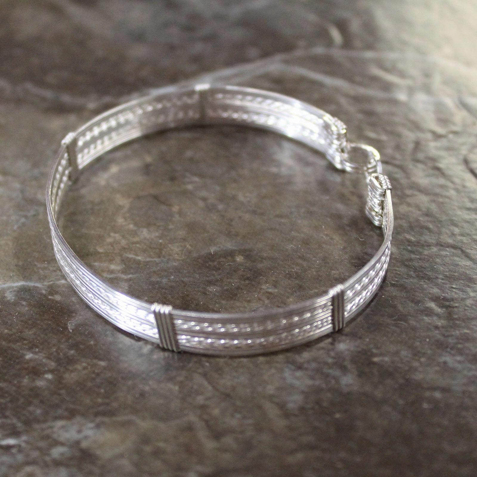 Fancy Sterling Silver 10-Strand Wire Wrapped Bracelet  SSTTSSTTSS Unexpected Twist Regal Touch