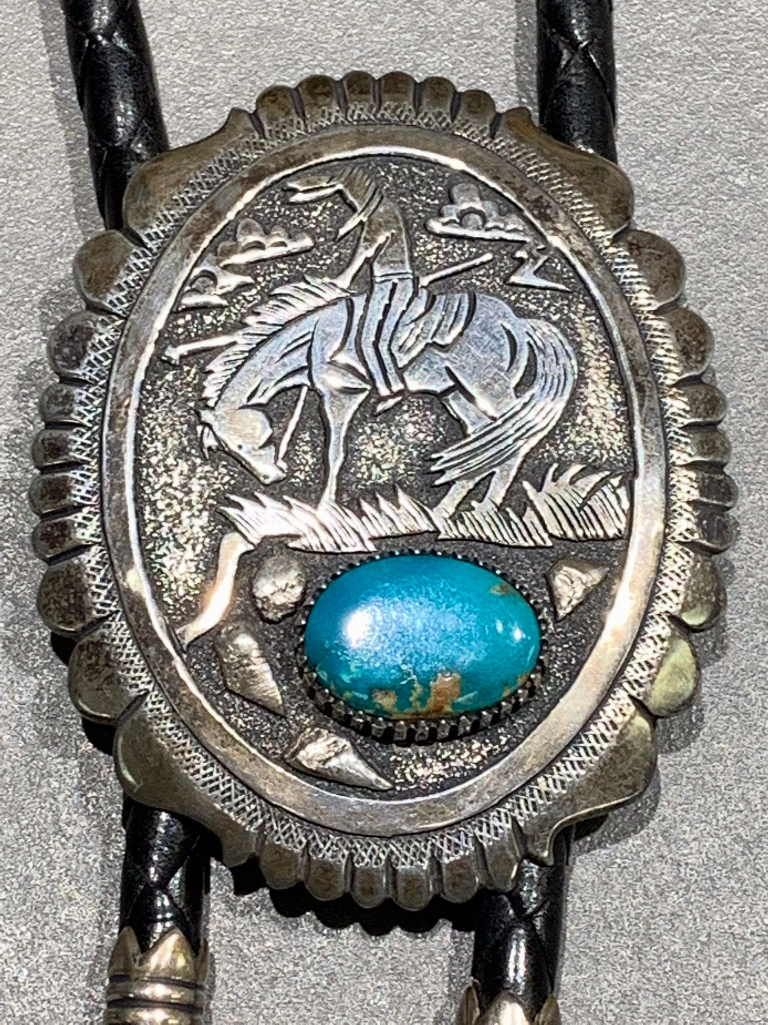 Tommy Singer Navajo ??End of the Trail?? Sterling Silver Turquoise Bolo Lively Accent Soft Glamour