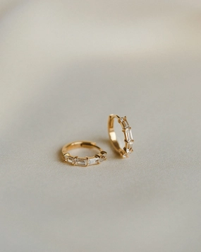 Nouveau White Sapphire Huggie Hoops Playful Spark