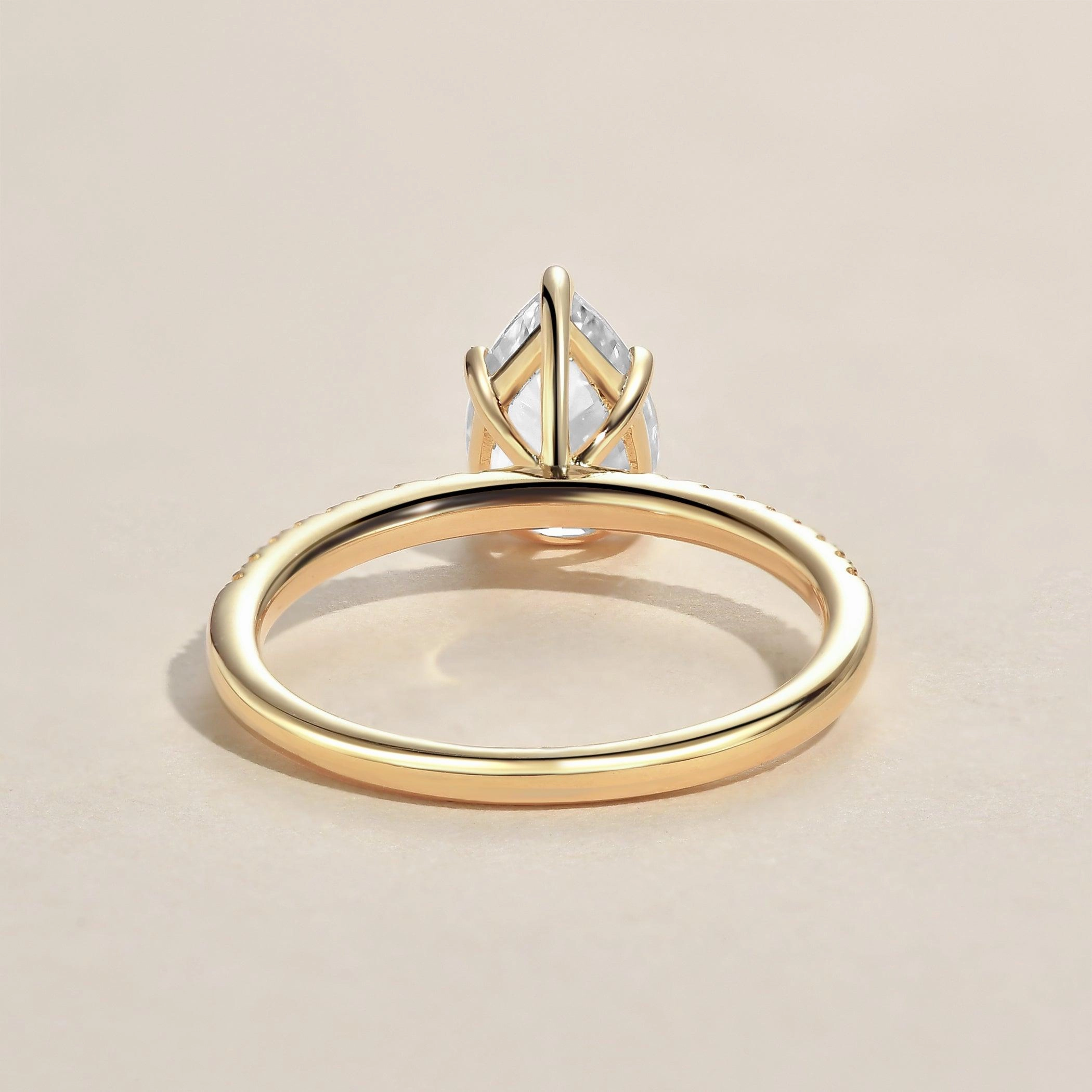 Layered Detail Polished Stones 1.5ct Pear Shaped Moissanite Pave Classic Solitaire Ring