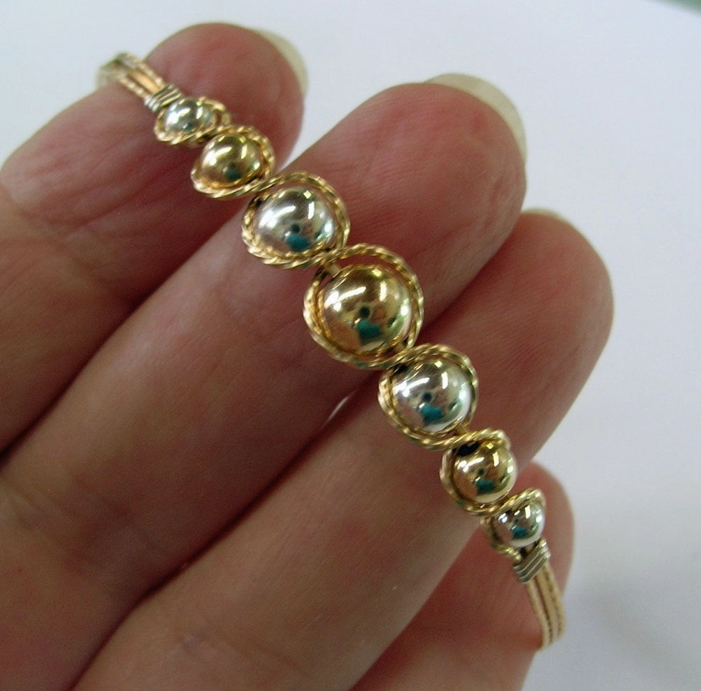 Respectable Amalgamations Gift-Wrapped Graduated Two Tone Gold Filled & Sterling Silver Beads Wire Wrapped Bracelet