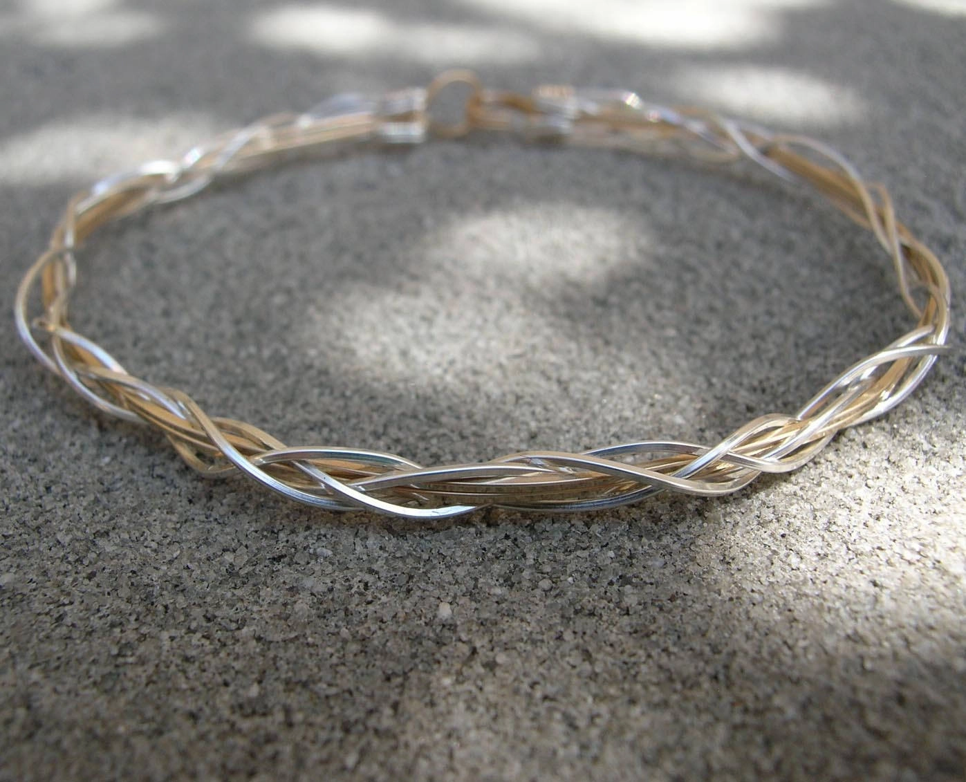 Thin Two-Tone Grapevine Silver Over Gold Wire Wrapped Bracelet Breaking Perspective