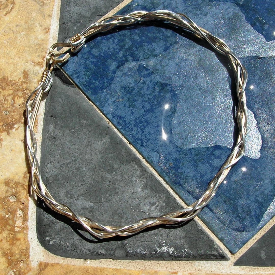 Restocked Unexpected Twist Thin Two-Tone Grapevine Silver Over Gold Wire Wrapped Bracelet