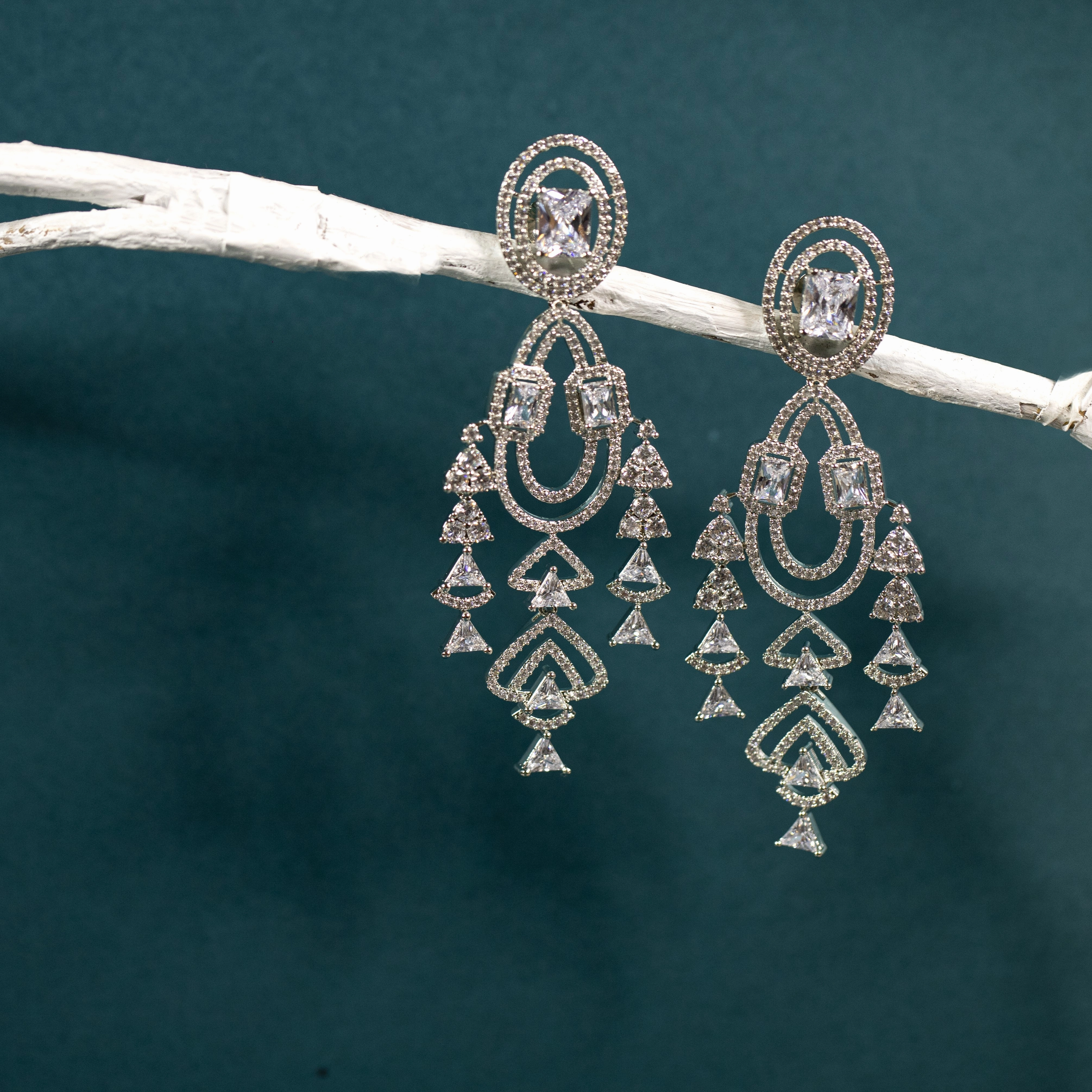 Gloss Layer Hang sang zircon statement earring.