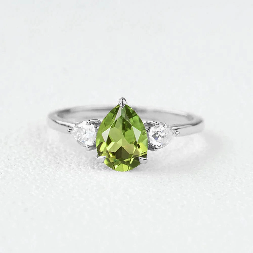 Evening Set Pear Shaped Peridot Three Stones Ring
