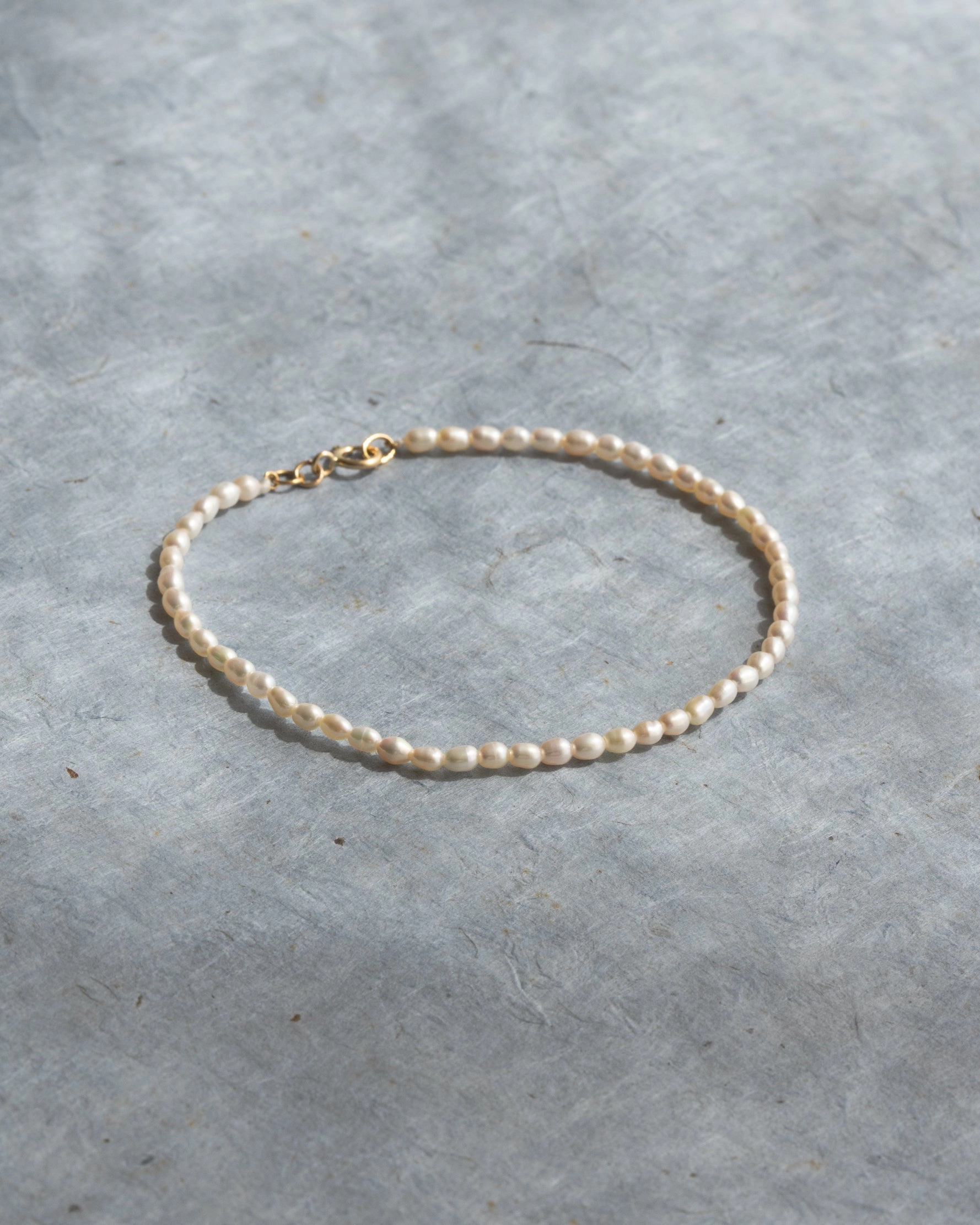 Modern Detail Mini Pearl Strand Bracelet