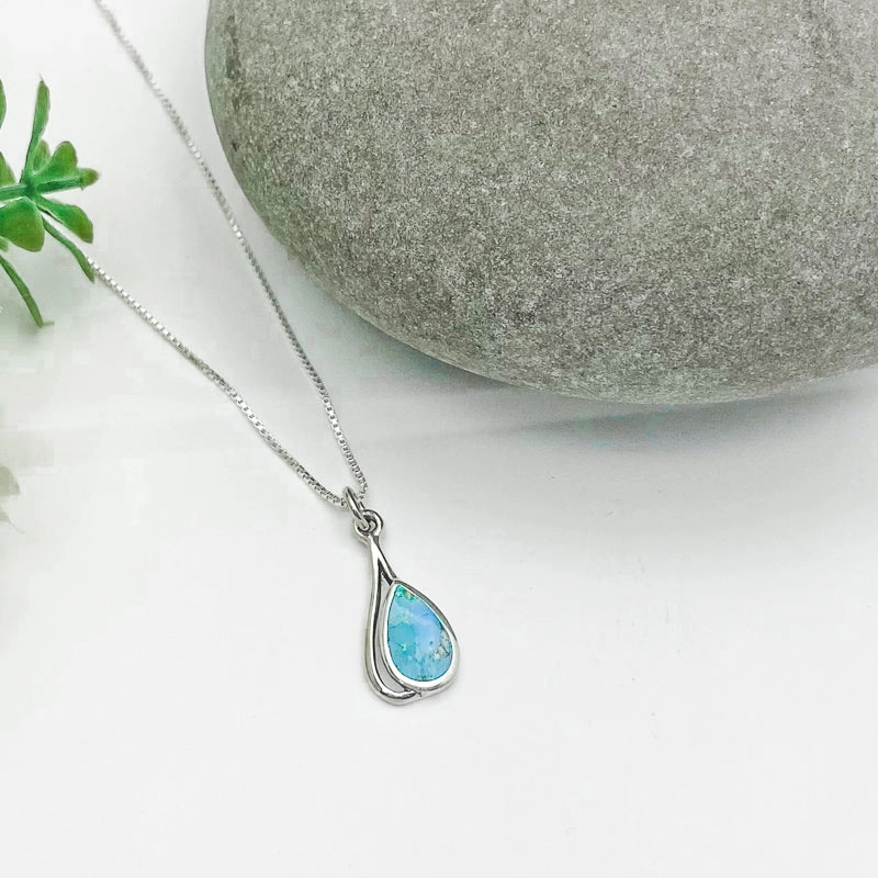 Radiant Touch Pieces Graceful Form Modern Turquoise Pendant In Sterling Silver.