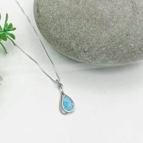Radiant Touch Pieces Graceful Form Modern Turquoise Pendant In Sterling Silver.