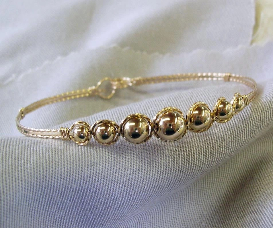 Current Trend Worldwide Amalgamations Graduated 14kt Gold Filled Beaded Wire Wrapped Bracelet