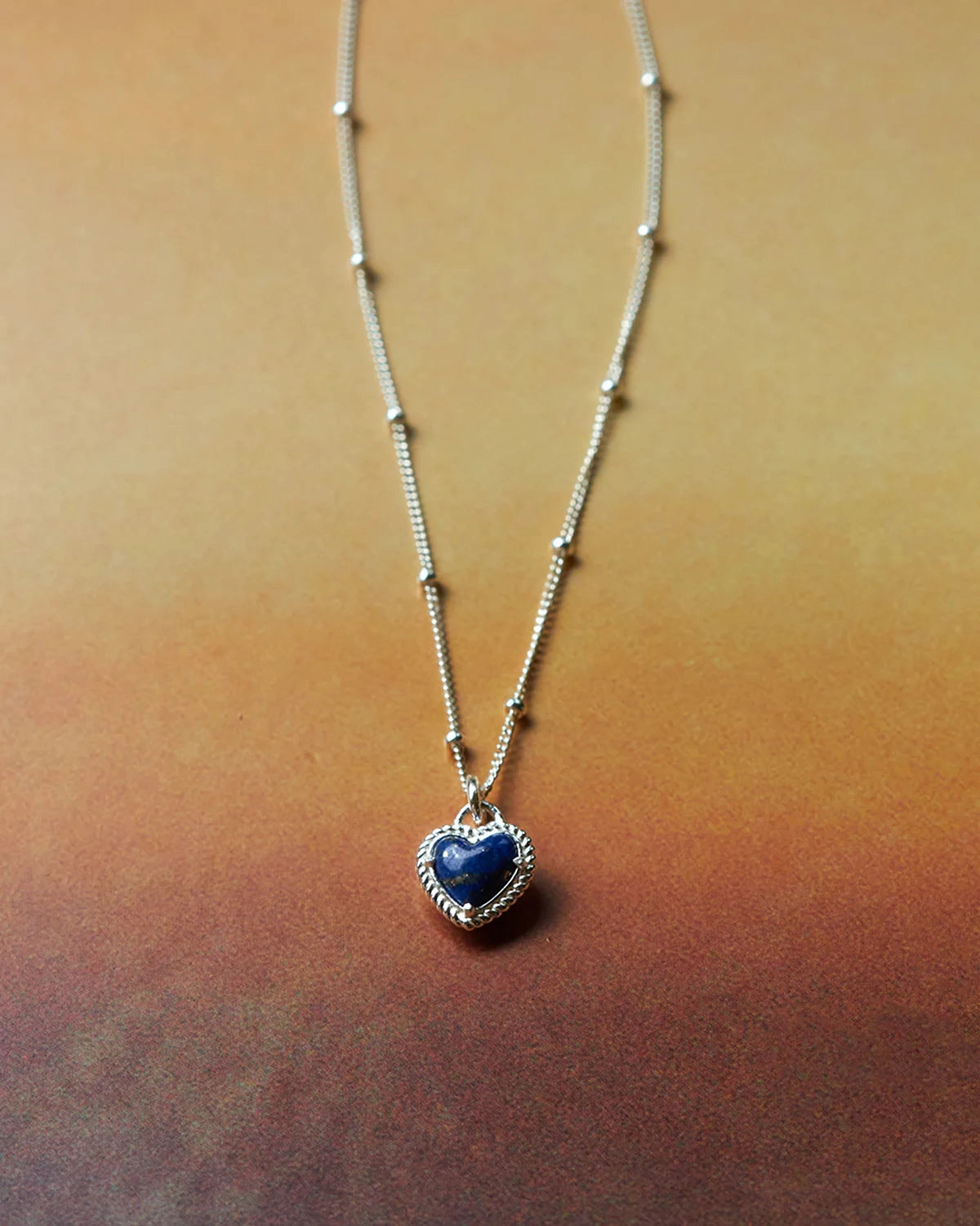 Glamorous Finish Lasso Heart Charm