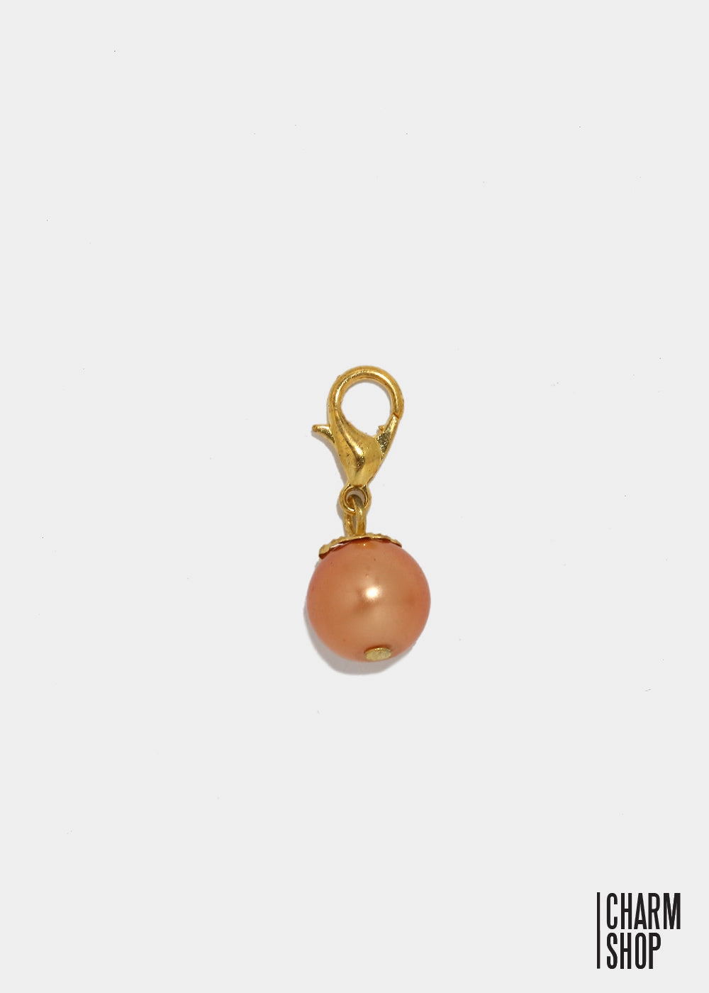 Sleek Spark Gold Tone Orange Pearl Dangle Charm