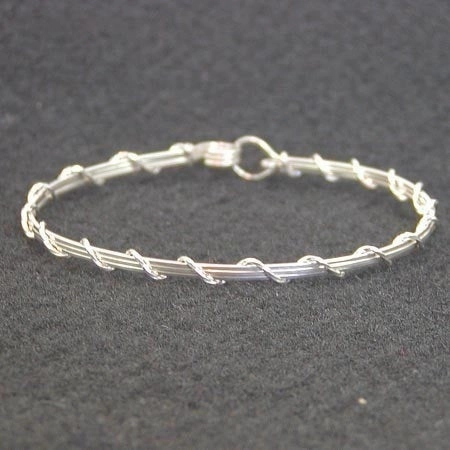 Never-Ending Sight Symbolic Vision Sterling Silver Thin 4-Strand Wire Wrapped Stackable Bracelet  SSSwa