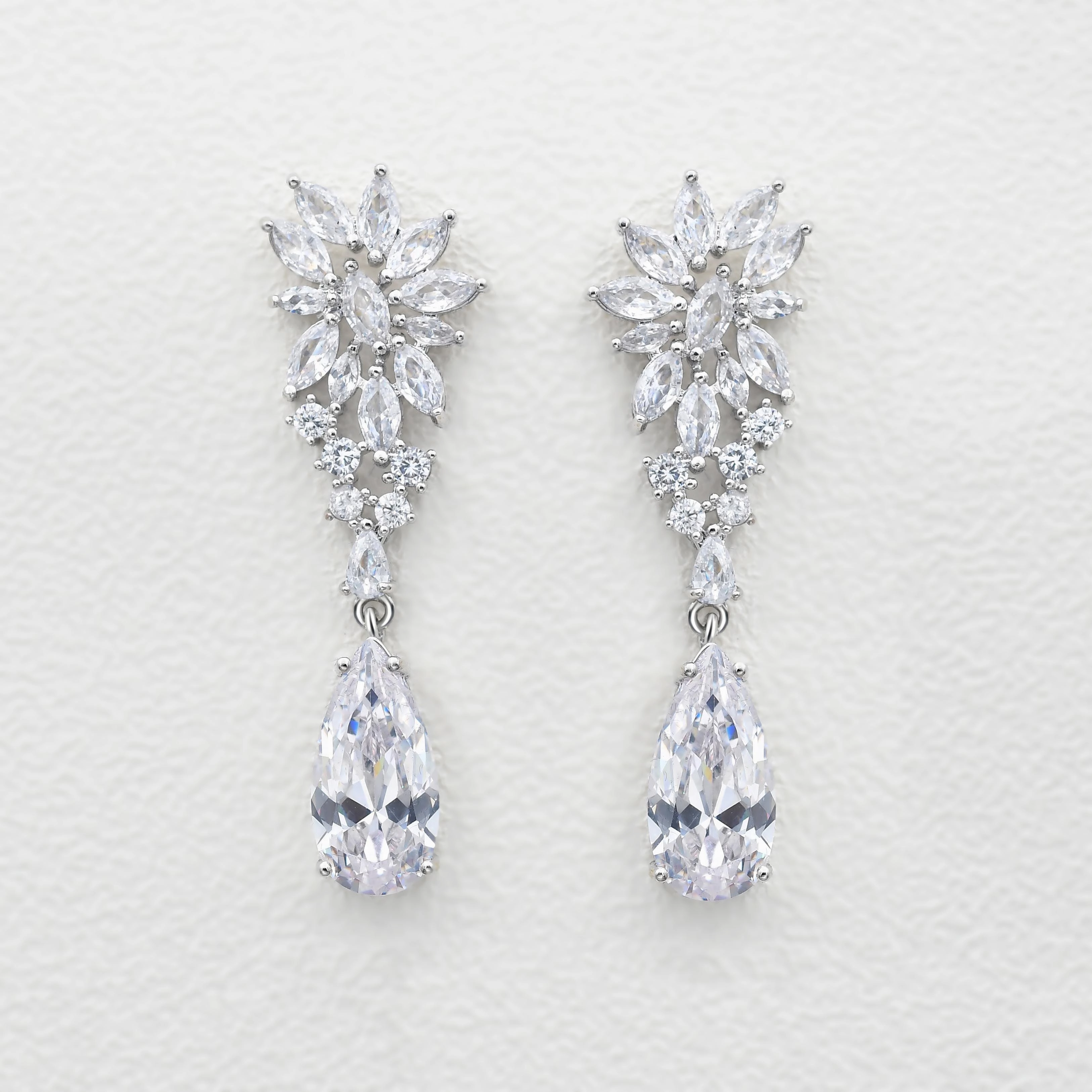 Stimulated Diamond Pear Drop Earrings Lifestyle Fit Bright Glow