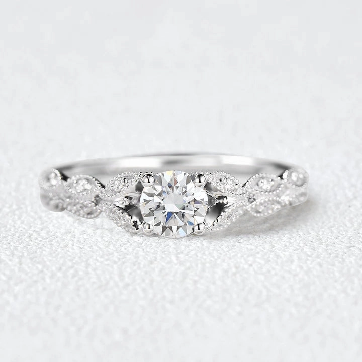 Pretty Accent Round Cut Vintage Moissanite Engagement Ring
