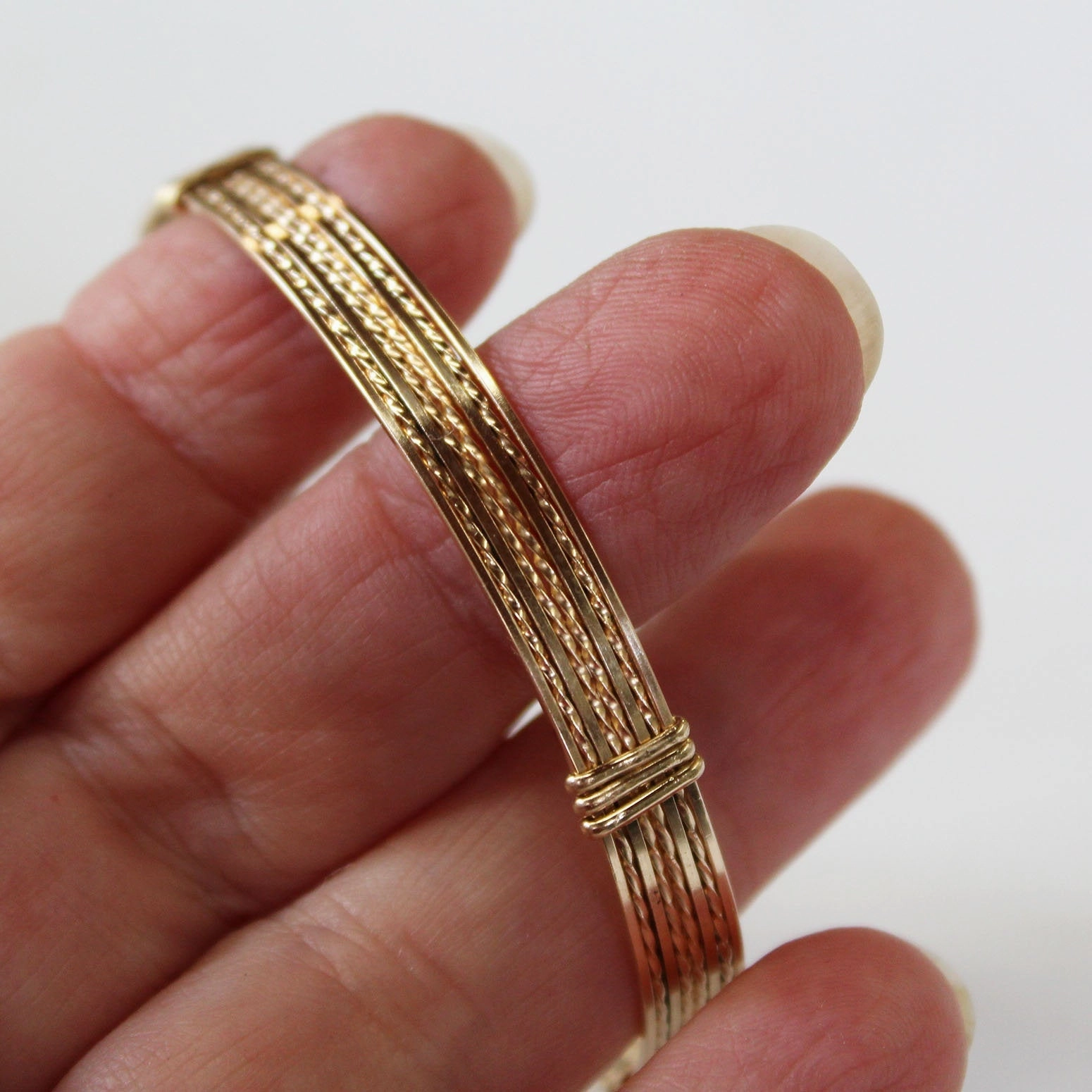 Universal Style Sneak Peek Sassy 14kt Gold Filled 8-Strand Wire Wrapped Bracelet  STSTTSTS