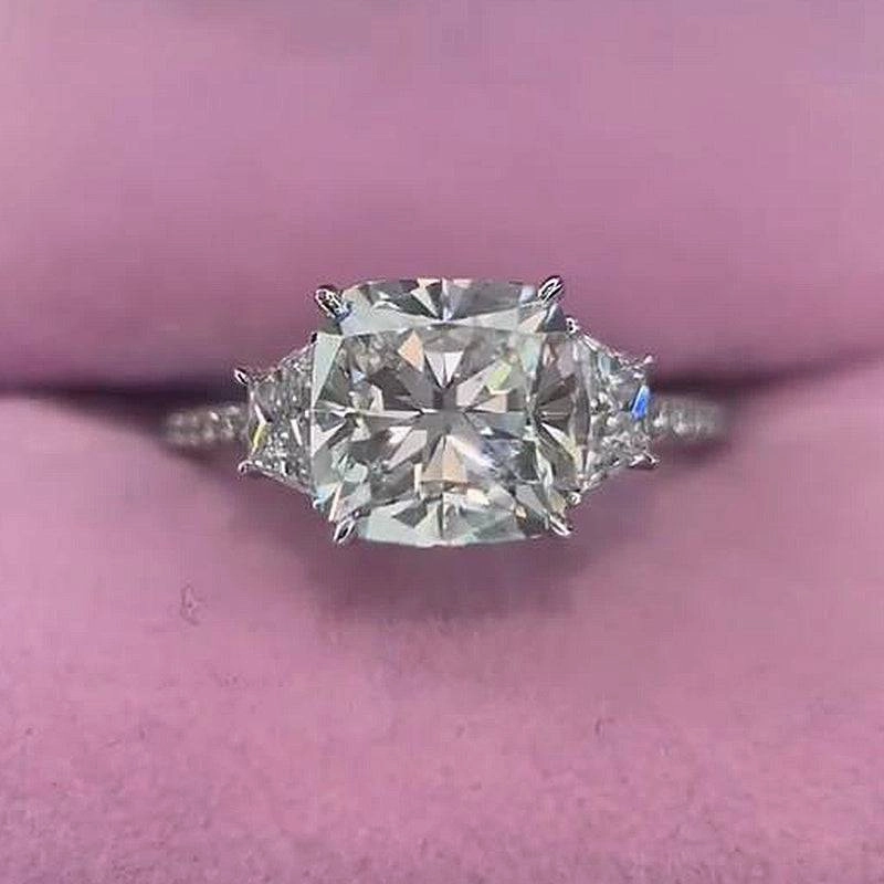 Expressive Feature Louily Sparkle Cushion Cut Three Stone Engagement Ring