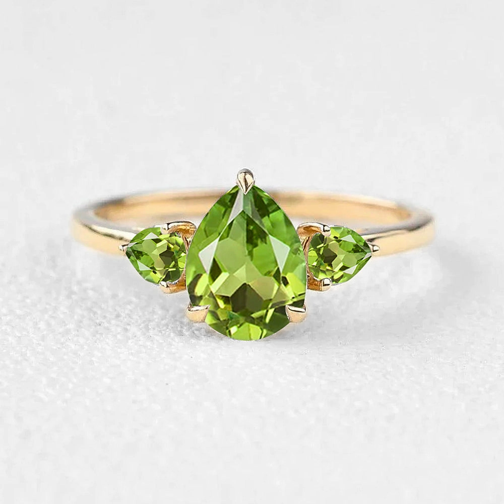 Polished Glow Premium Look Pear Peridot Three Stones Engagement Ring