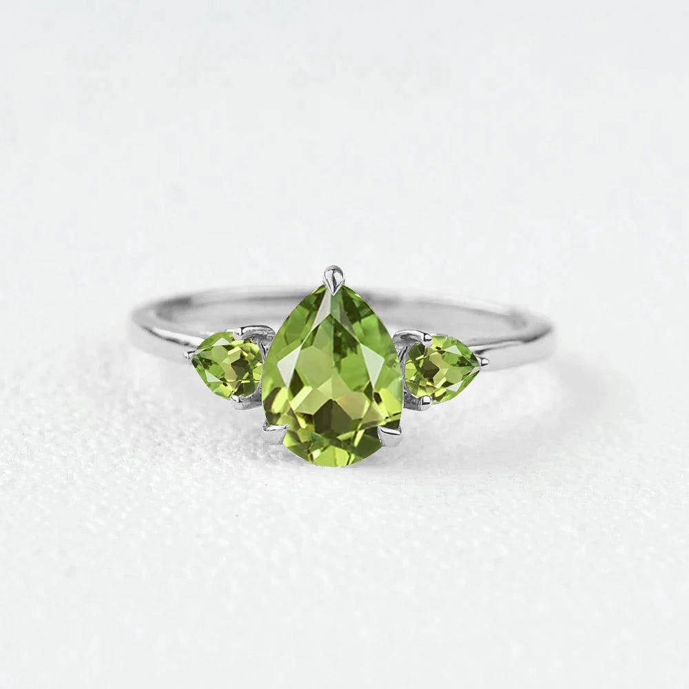 Pear Peridot Three Stones Engagement Ring Polished Details