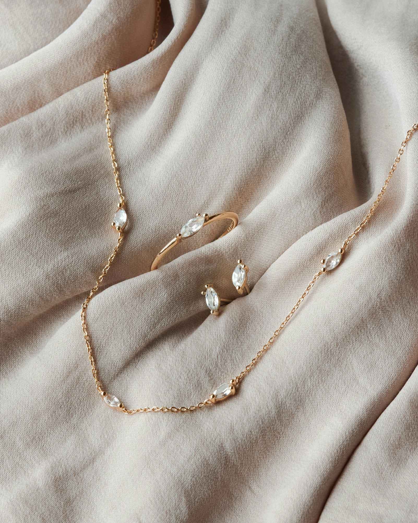 White Sapphire Leaflet Studs Sophisticated Embellishments Minimal Charm