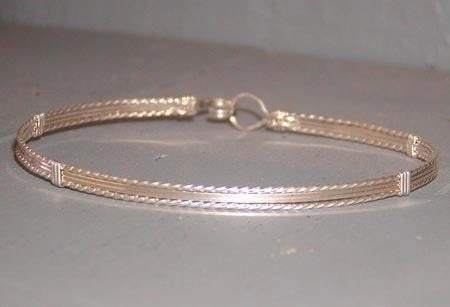 First-Class Detail Holiday Sparkle Sterling Silver 4-Strand Wirewrapped Stackable Bracelet  TSST