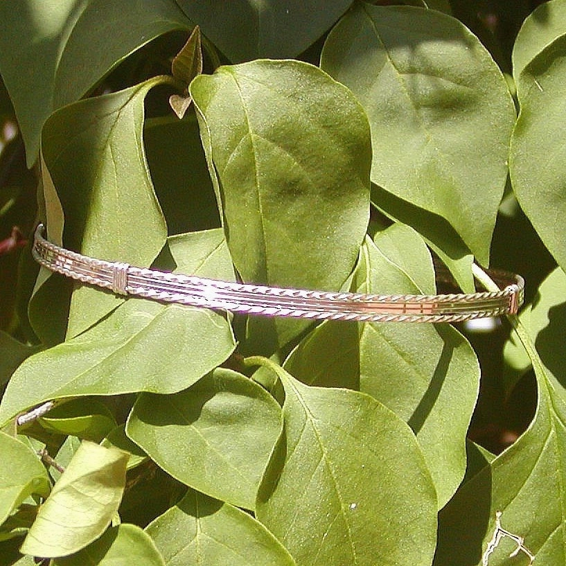 Opportune Collaboration Universal Amalgamations Sterling Silver 4-Strand Wirewrapped Stackable Bracelet  TSST