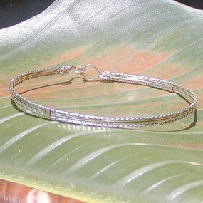 Precious Keepsake Collaborative Design Sterling Silver 4-Strand Wirewrapped Stackable Bracelet  TSST