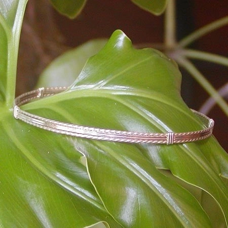 Consistent Perspective Sterling Silver 4-Strand Wirewrapped Stackable Bracelet  TSST